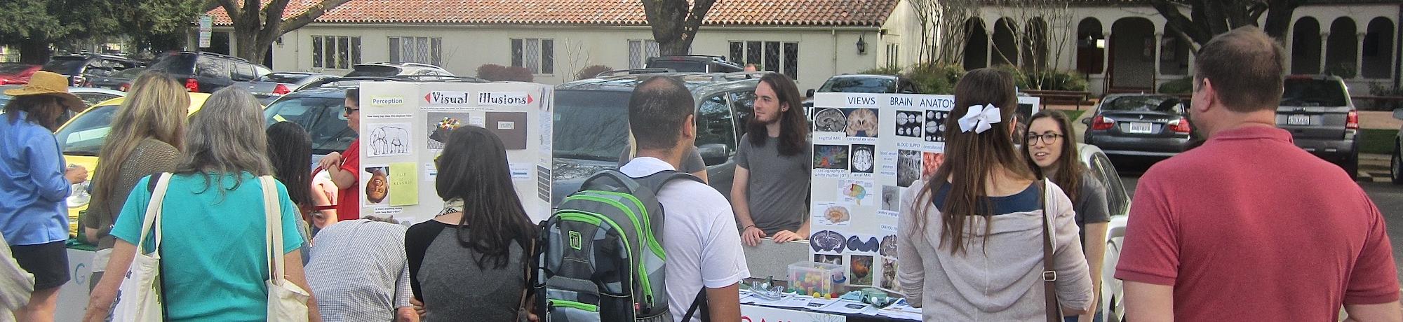 Neuroscience grad student outreach booth at Davis Farmer's Market