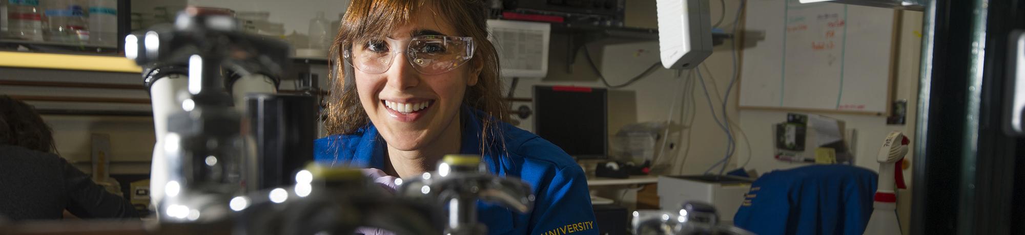 Graduate student working in lab